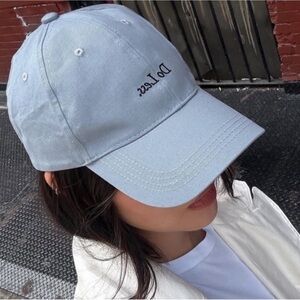 NWT! Merit Beauty Blue Baseball Cap with Embroidered "do less"